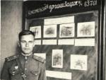 М.А. Ємельянов біля стенду комсомольської організації. 1951 р.